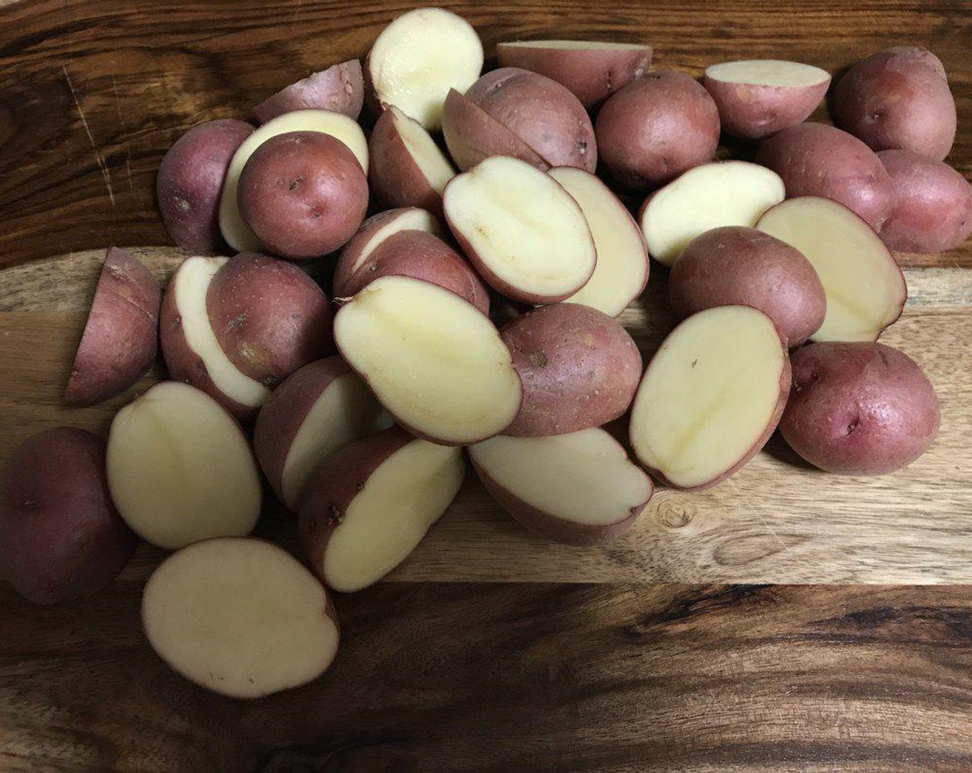 step 1 Start out by preparing the Baby Red Potatoes (9 cups). Cut the biggest ones in half or quarters. If you can't find baby potatoes, you can still use larger ones and cut into bite-sized pieces.