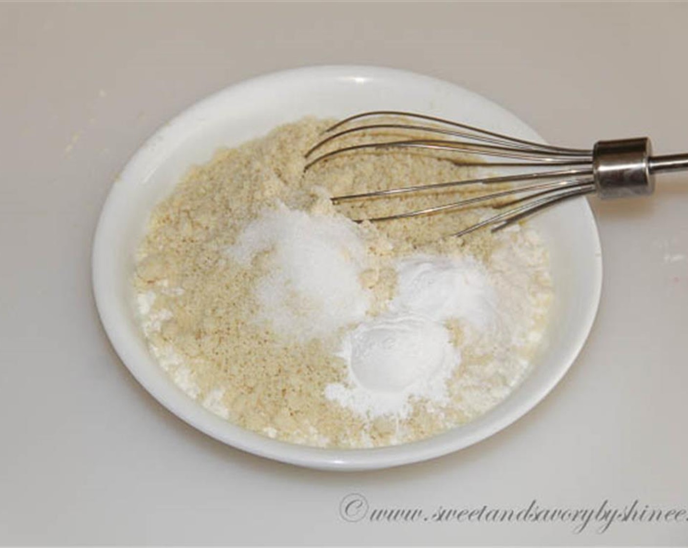 step 2 In a small bowl, whisk together All-Purpose Flour (1 cup), Almond Flour (1/2 cup), Baking Soda (1/2 tsp), Baking Powder (1 tsp), and Salt (1/2 tsp).