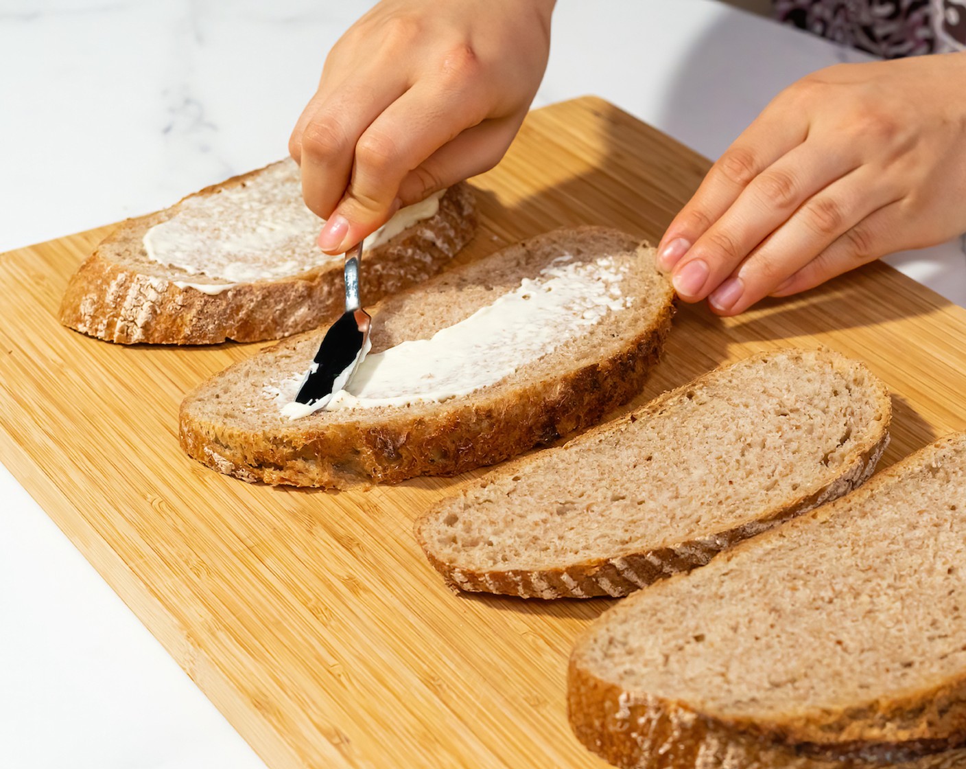 step 1 Slather one side of each piece of Rustic Bread (4 slices) with ½ Tbsp of Japanese Kewpie Mayonnaise (2 Tbsp).