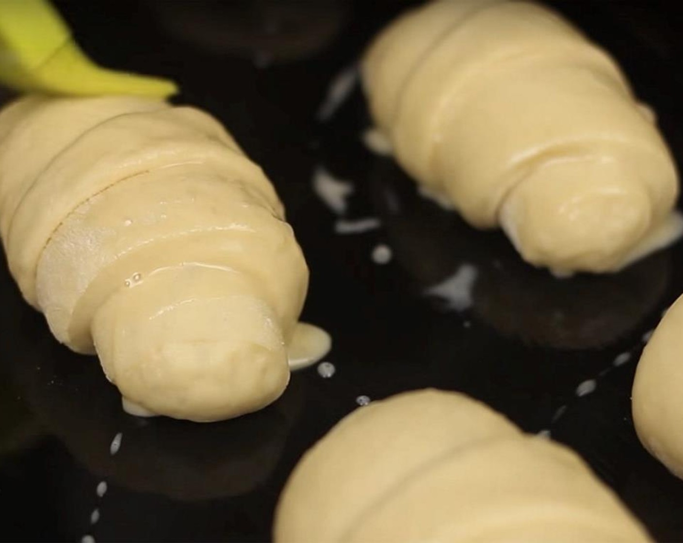 step 12 For the egg wash, mix together Egg (1) and Milk (1 Tbsp). Gently brush them with egg wash and bake it in the oven for 10 to 15 minutes.