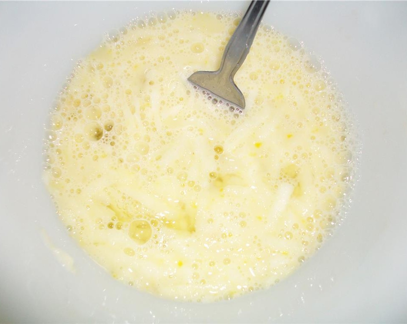 step 4 In another bowl, whisk the Eggland's Best Classic Egg (1) and then add shredded apple and Milk (1/2 cup) to the bowl. Add this mixture to the flour mixture. It will make a thick batter.