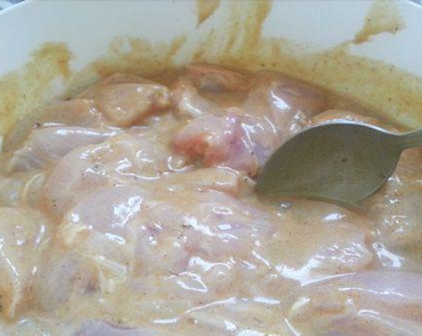 step 2 In a bowl add the juice from Limes (2 1/2), Yogurt (4 Tbsp), Olive Oil (3 Tbsp), Simply Organic Garlic Powder (2 Tbsp), Ground Ginger (1 tsp), Dried Oregano (1 pinch), Paprika (1 tsp), Ground White Pepper (1 tsp), Apple Cider Vinegar (1/2 tsp), Tomato Paste (1/2 tsp), and Salt (to taste) and combine well. Add chicken and marinate in the fridge for a minimum of four hours or overnight.