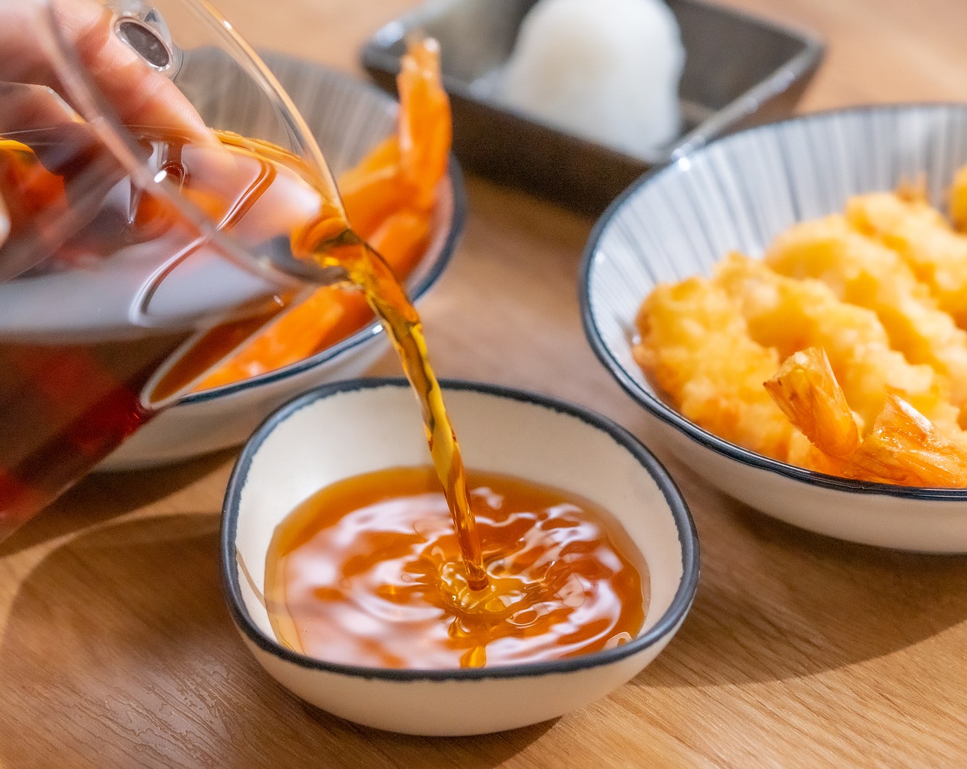 step 10 Serve the shrimp tempura with tempura dipping sauce and grated Daikon Radish (1) on the side.