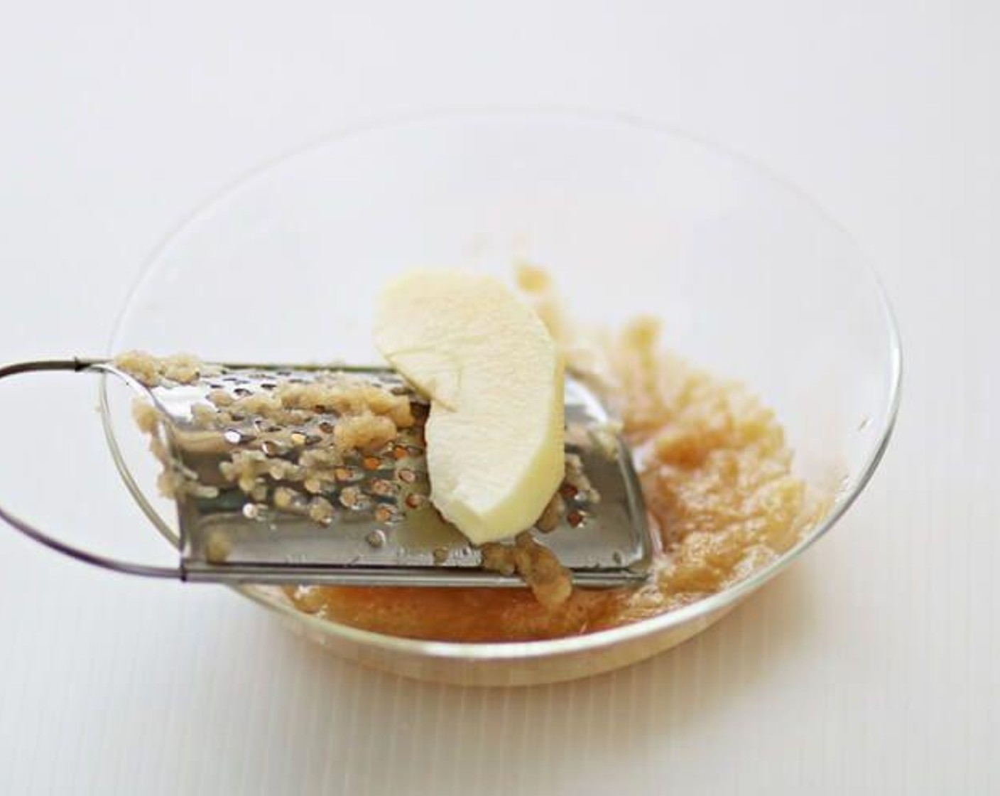 step 5 Add Red Apple (1/3 cup) in a bowl and mix well with 1 tablespoon apple liquid.