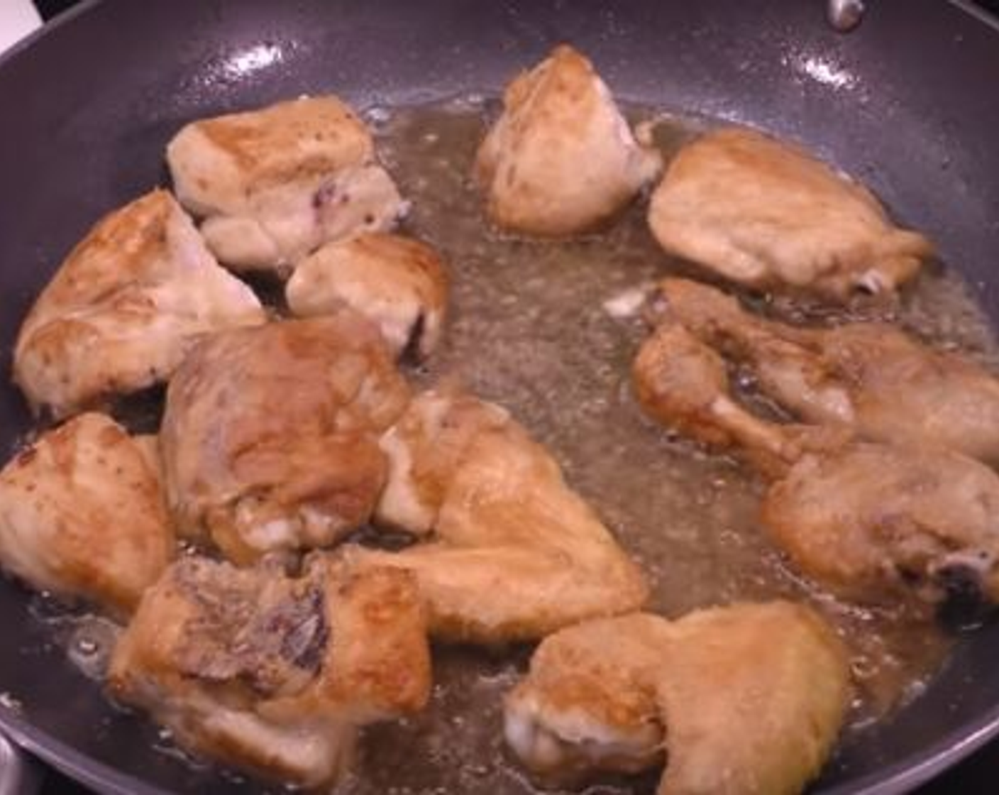 step 4 Once the chicken pieces are golden brown and crispy on both sides, pour in the White Wine (3/4 cup). Cook together for 5-10 minutes on medium heat so that the alcohol evaporates but adds flavor to the dish.