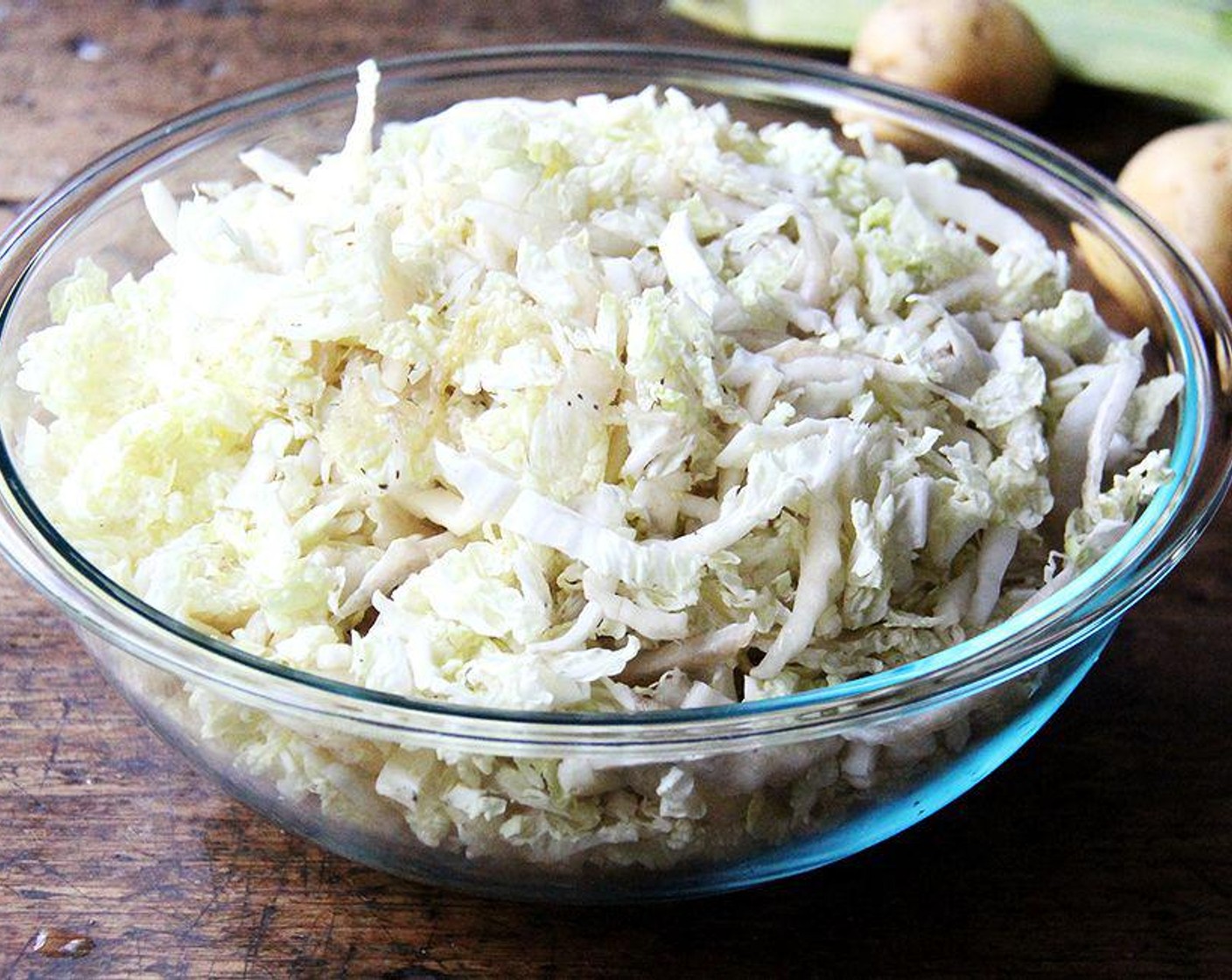 step 1 Place Green Cabbage (12 cups) in a large bowl. Bring enough water to a boil — I fill a tea kettle, but you could always fill a large sauce pan — to submerge the cabbage in the bowl. Pour the water over the cabbage; let sit one minute or longer; drain.