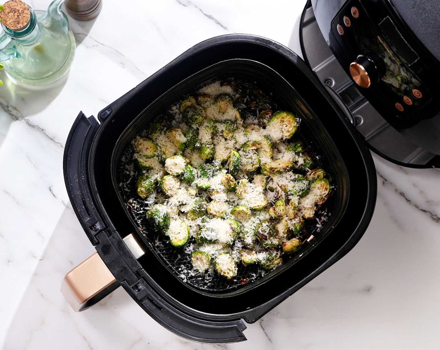 step 3 Toss the brussels sprouts, then sprinkle Parmesan Cheese (1/2 cup) on top of each one in an even layer.