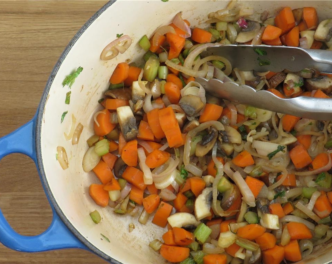 step 4 Add Cremini Mushrooms (4 1/2 cups) and Shallots (4) and cook 4-5 minutes, until tender. Stir in Red Wine (1 cup), Tomato Paste (1/4 cup), and Low-Sodium Beef Broth (2 cups).