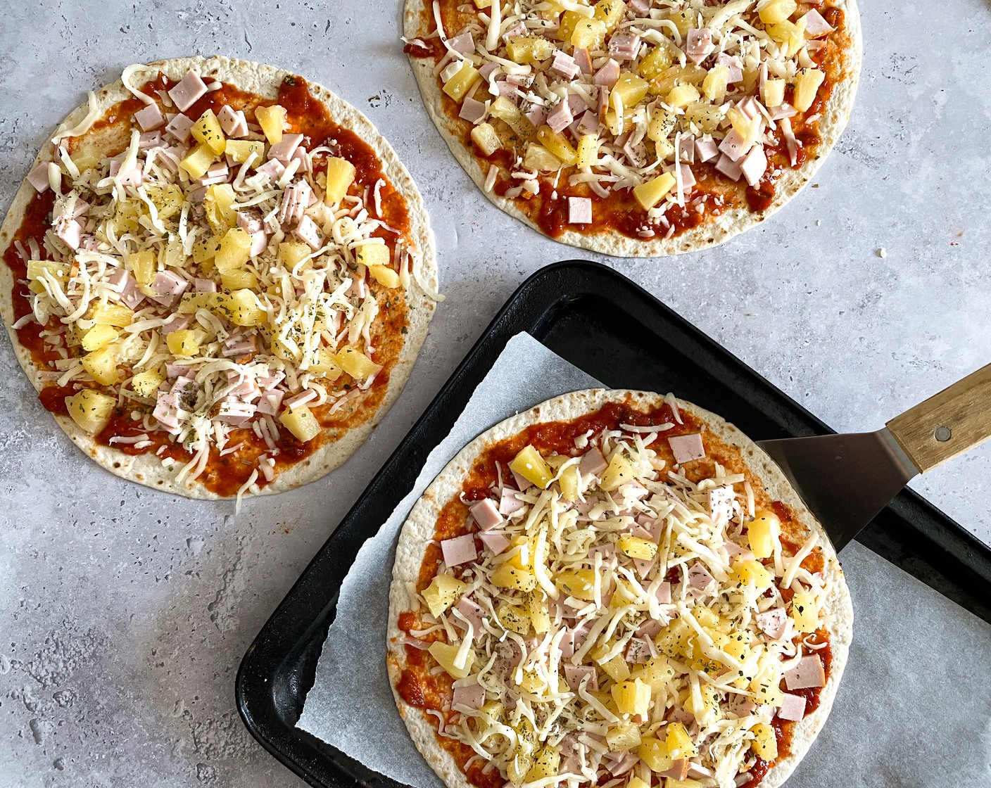 step 5 Place onto a baking paper lined baking trays and bake in two batches of four for 8-10 minutes. Cheese should be bubbling and melted and the sides golden and crispy.