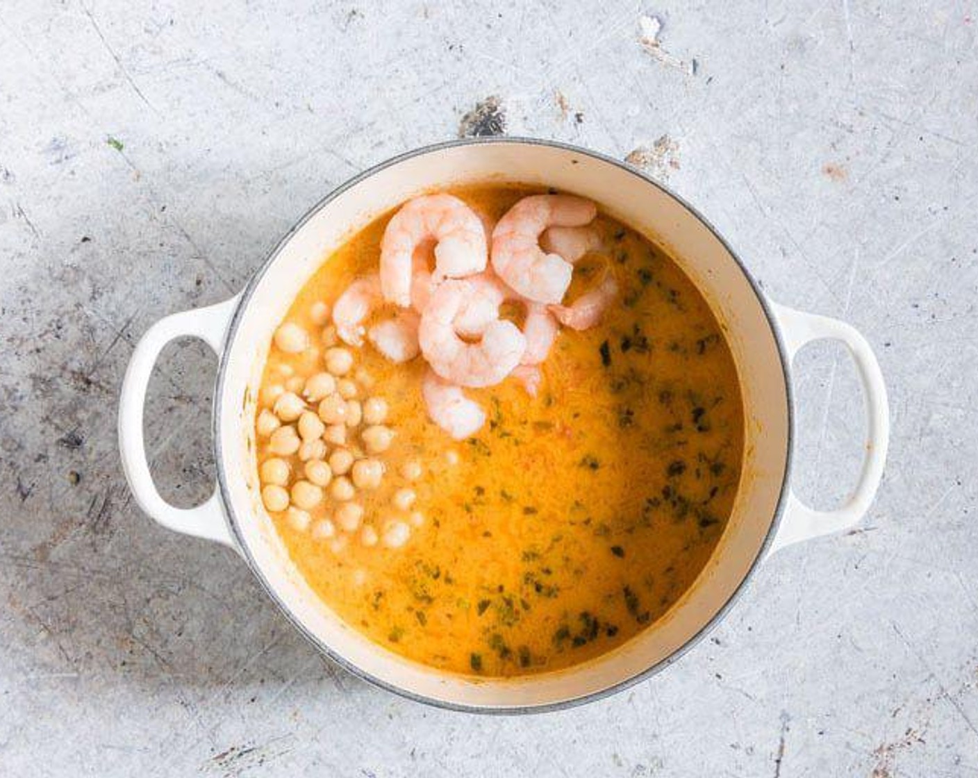 step 4 Add in the King Prawns (7 oz) and Canned Chickpeas (2 cups).  simmer for 3-4 minutes until the prawns are defrosted and warmed through.