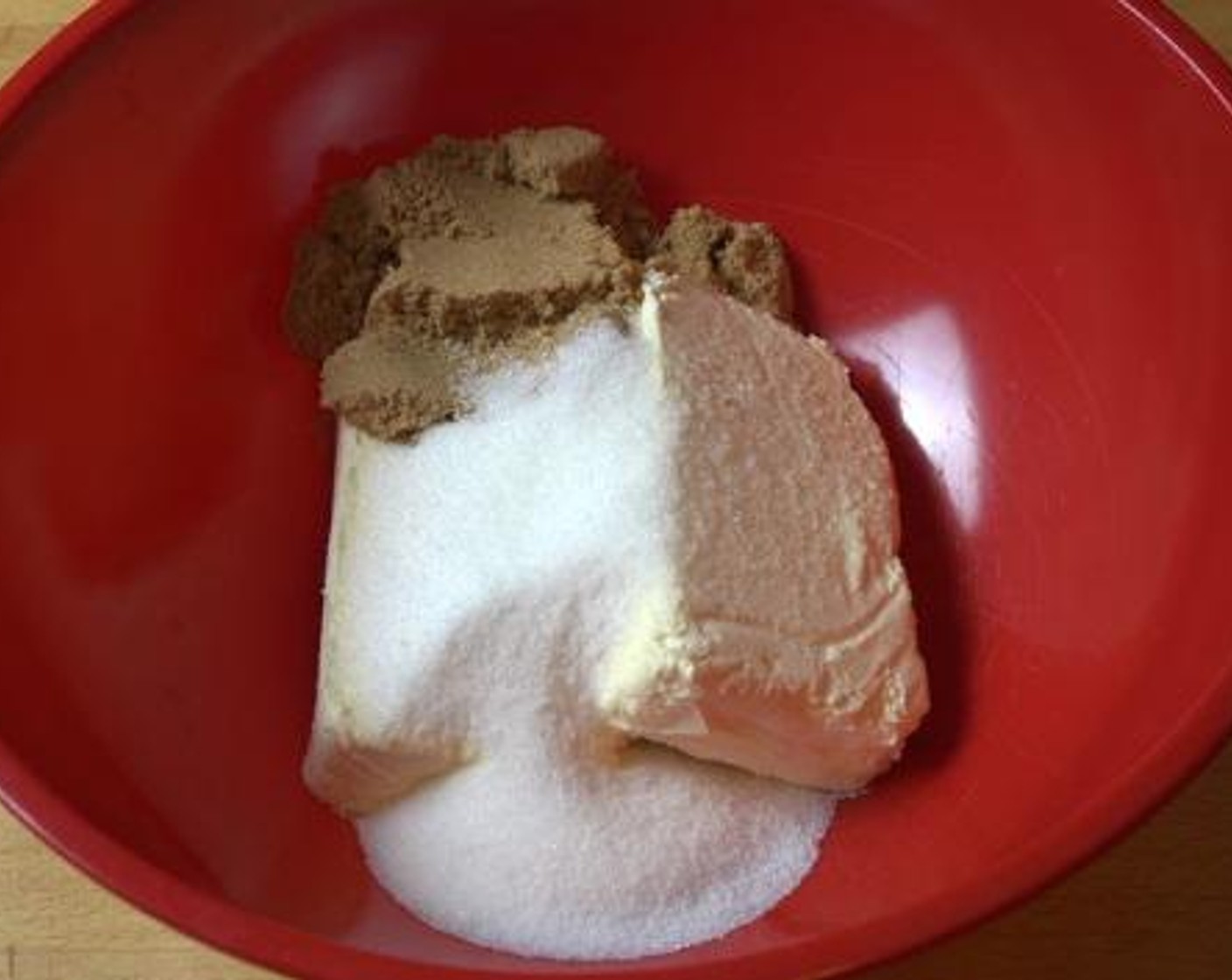 step 4 In another separate bowl, mix together the Cream Cheese (2 pckg), Brown Sugar (1/2 cup), Caster Sugar (1/2 cup) until they are nice and creamy.