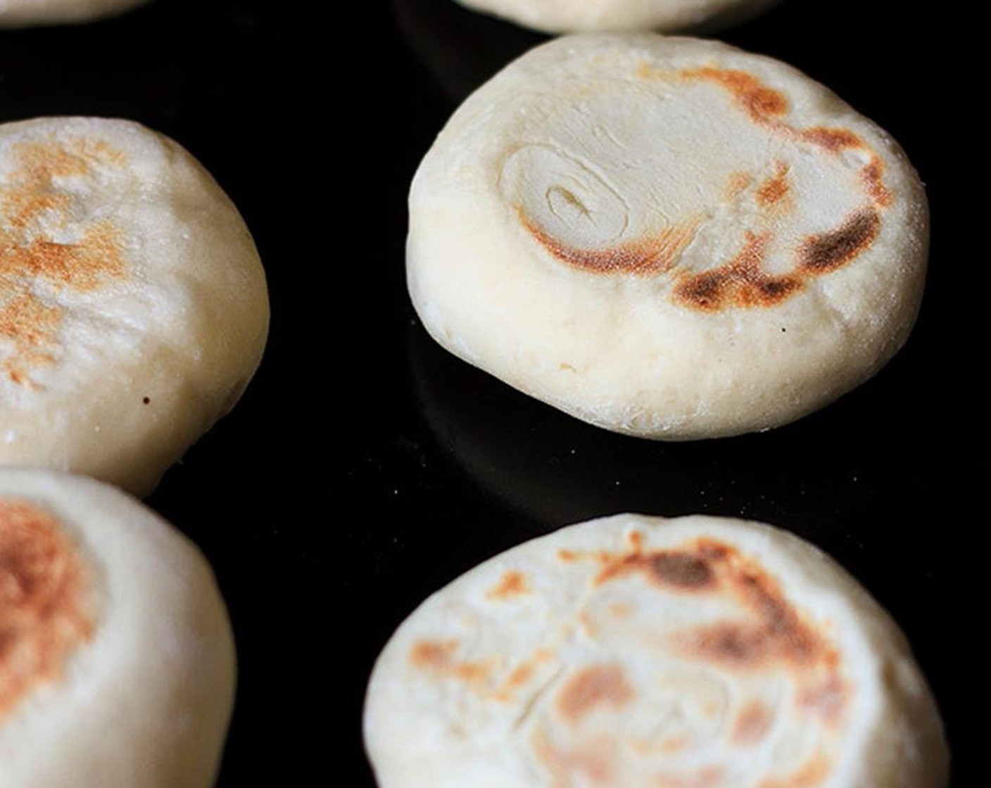 step 11 Transfer the buns to a baking sheet. Bake for 10 minutes so the breads are completely cooked through.