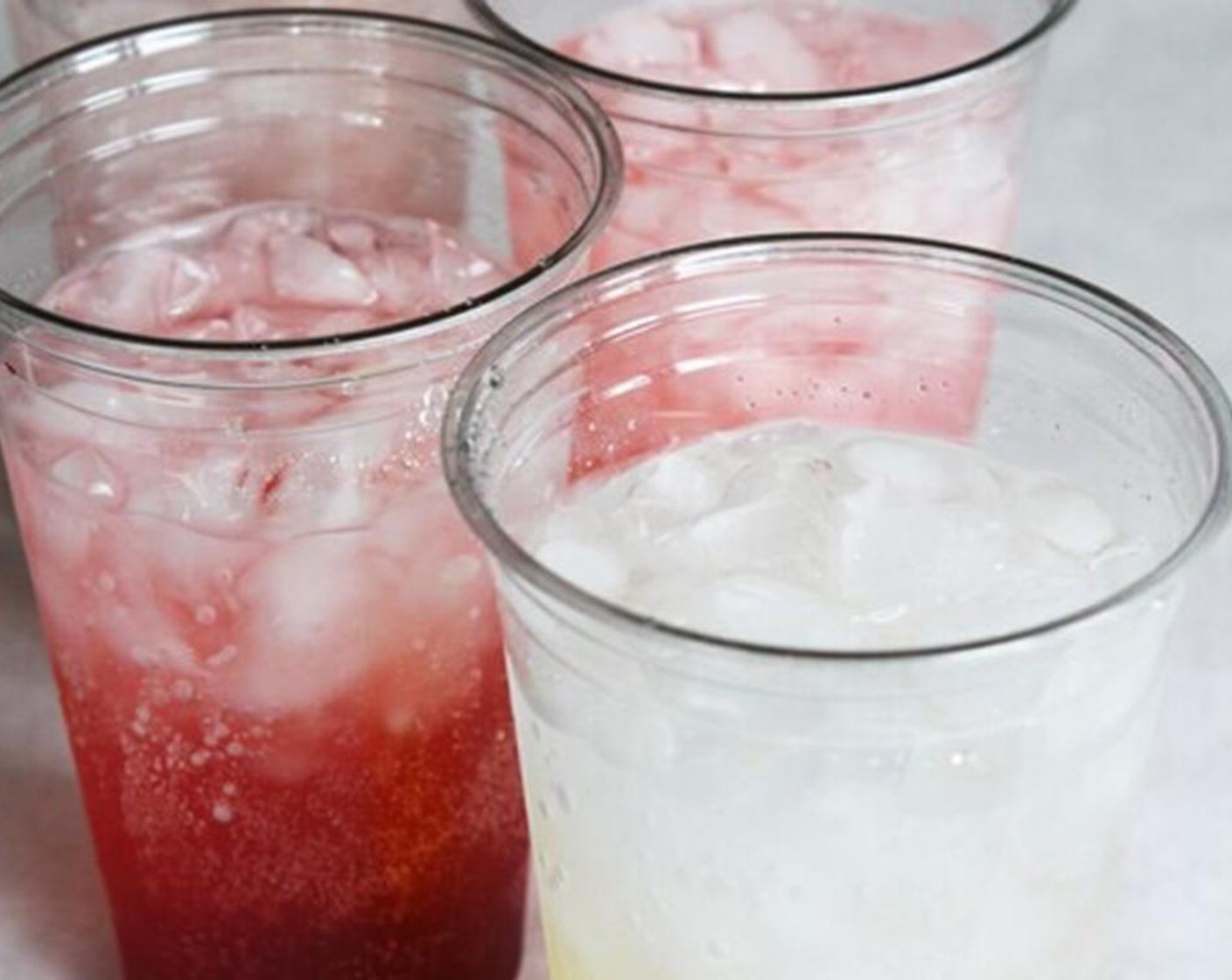 step 3 Pour Soda Water (to taste) to about 1 - 1 1/2 inches from the top of the cup.