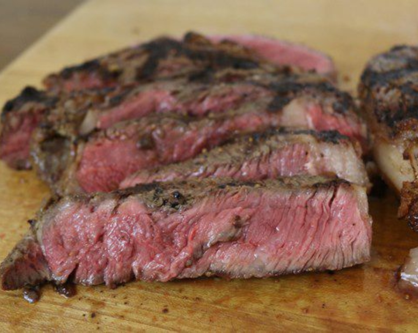 step 9 Serve these ribeyes with the Red Wine/Mushroom sauce over the top.  Ribeyes go great with a simple salad and baked potato but you can serve them and enjoy with your favorite side dish.