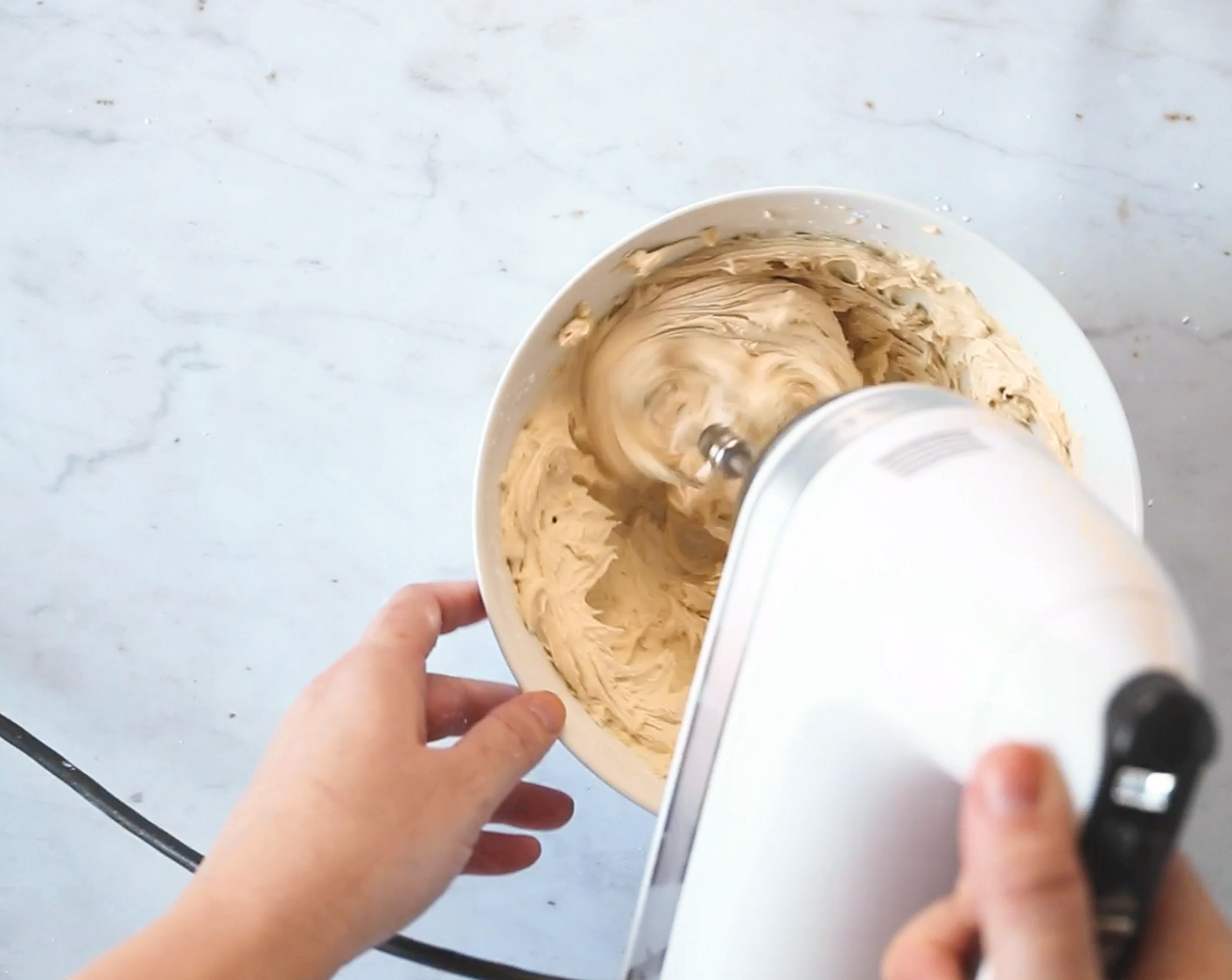 step 6 In a medium bowl, beat the Butter (1/2 cup), Molasses (1 tsp), and Powdered Confectioners Sugar (1 cup) together until smooth, add in the Cream (1 Tbsp) and beat until light and fluffy, about 2 minutes.