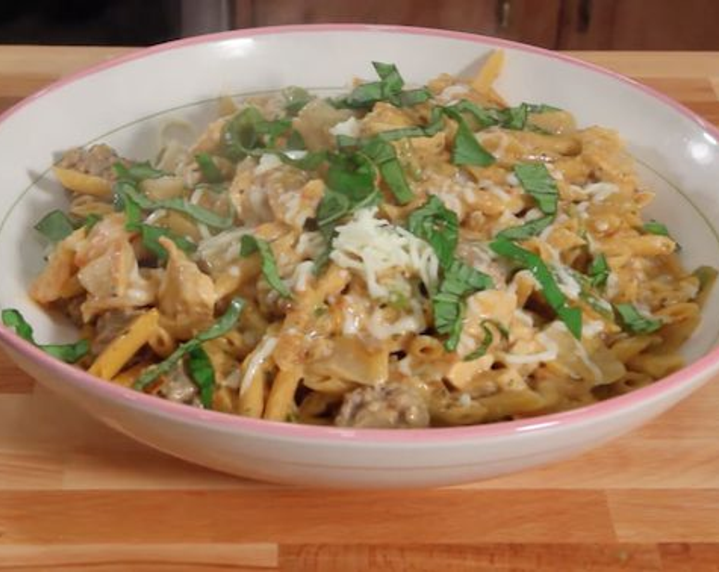 step 8 Serve topped with Shredded Mozzarella Cheese (to taste) and Fresh Basil Leaves (to taste).