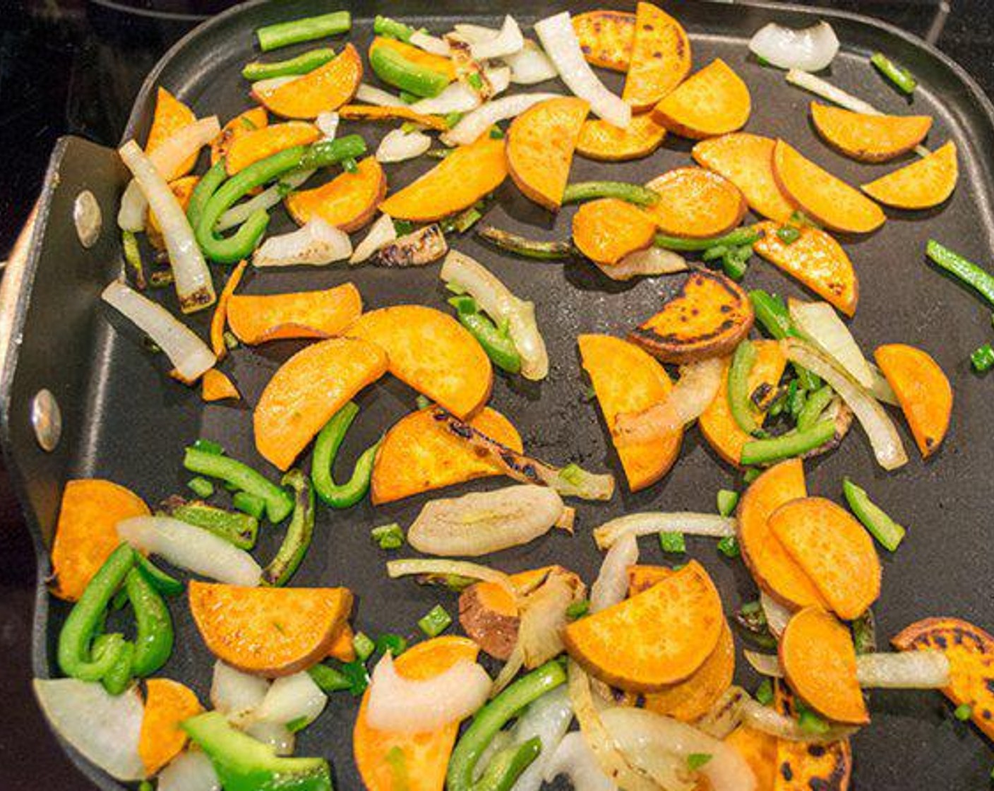 step 1 Add Sweet Potatoes (2), Onion (1/2) and Bell Pepper (1/2) to pan on stove top and cook until tender. Season with a bit of salt and better. Set aside.