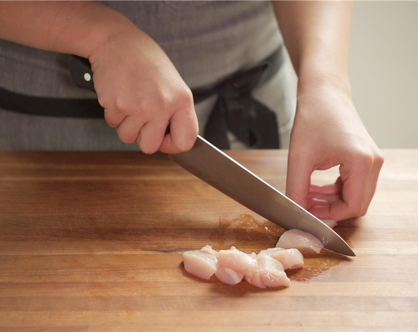 step 6 Pat dry Skinless Chicken Breasts (2) and slice into 1-inch sliced pieces, then set aside.