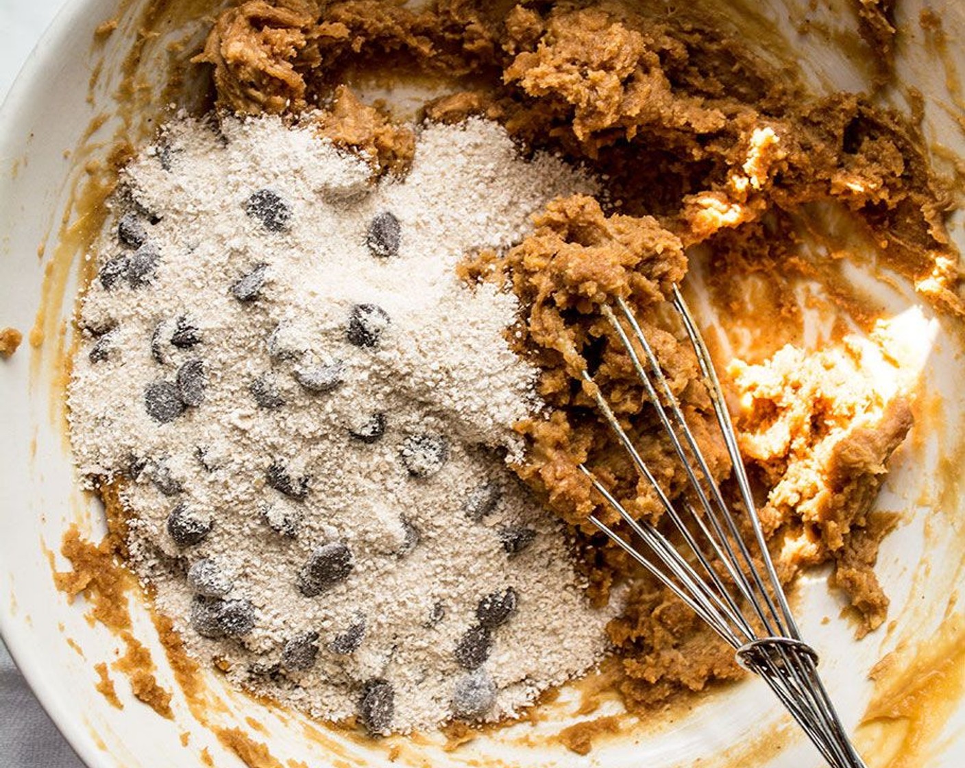 step 4 Add dry ingredients to peanut butter mixture, then stir until well combined. Spread evenly into greased 8x8-inch pan.