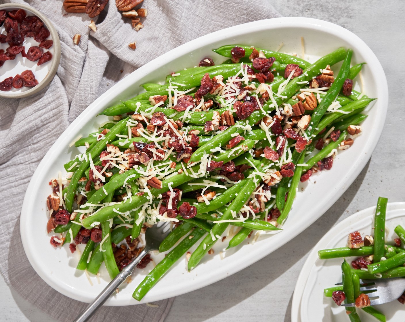 step 6 Toss Pecans (1/2 cup), Dried Cranberries (1/2 cup), Shredded Italian Blend Cheese (1/4 cup) together and season to taste with more Freshly Ground Black Pepper (to taste).