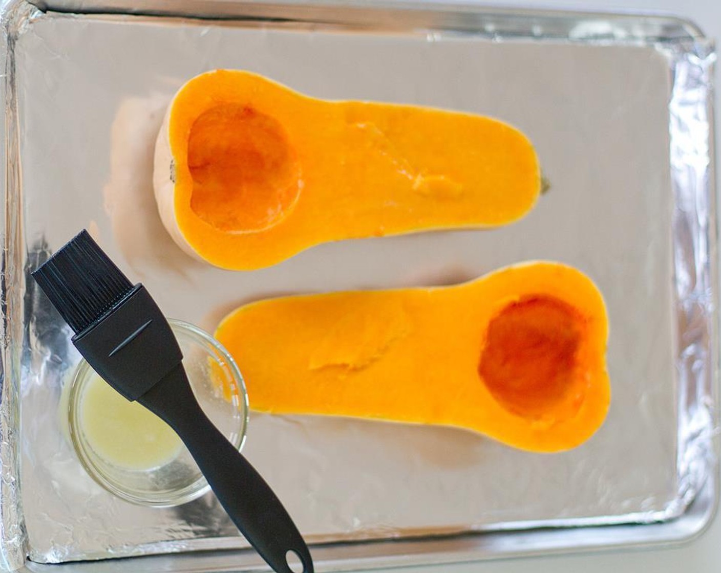 step 4 Melt a third of the Unsalted Butter (1 Tbsp) and brush on the Butternut Squash.