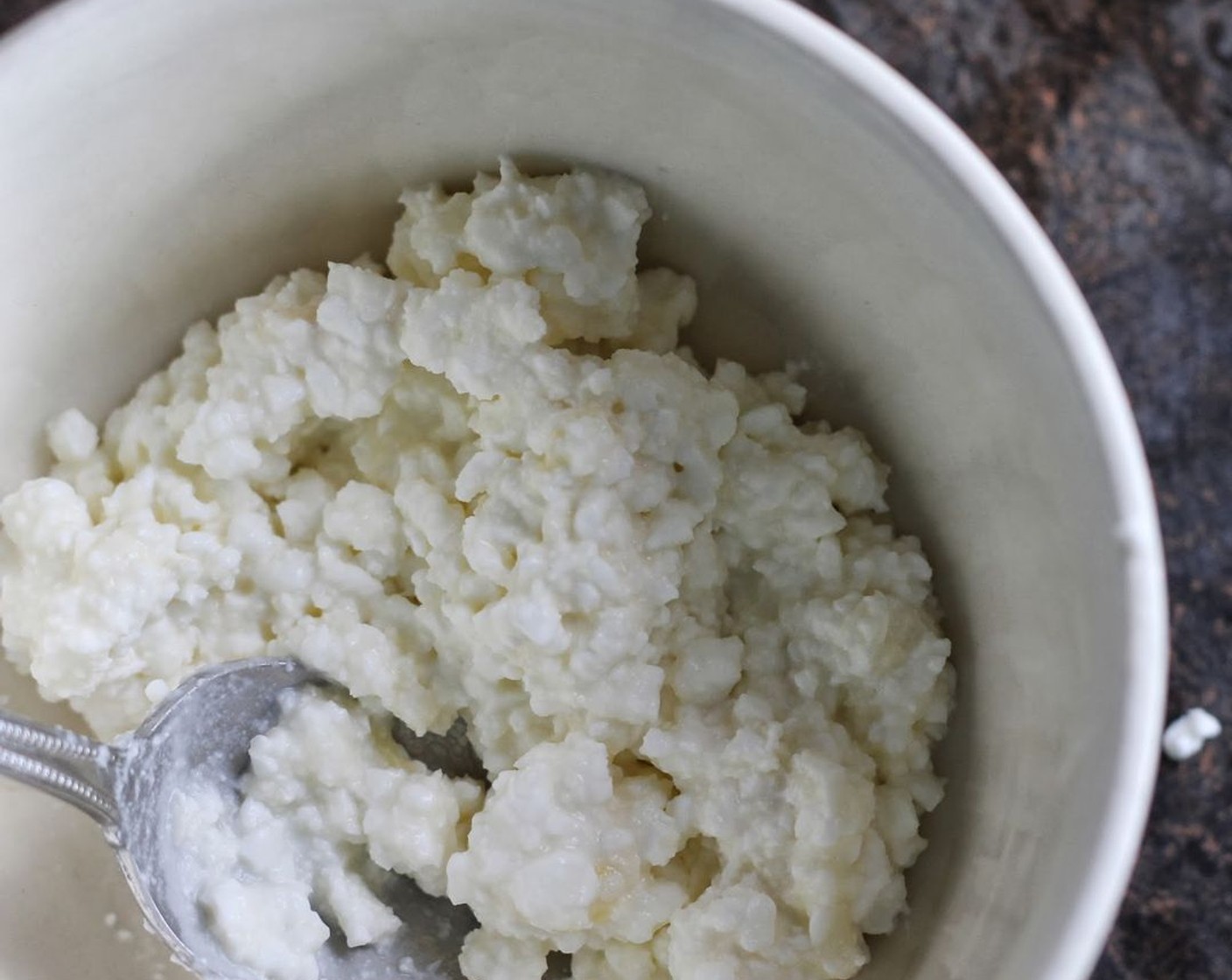 step 7 For the filling, mix together Cottage Cheese (3/4 cup) and Grated Parmesan Cheese (1/4 cup).