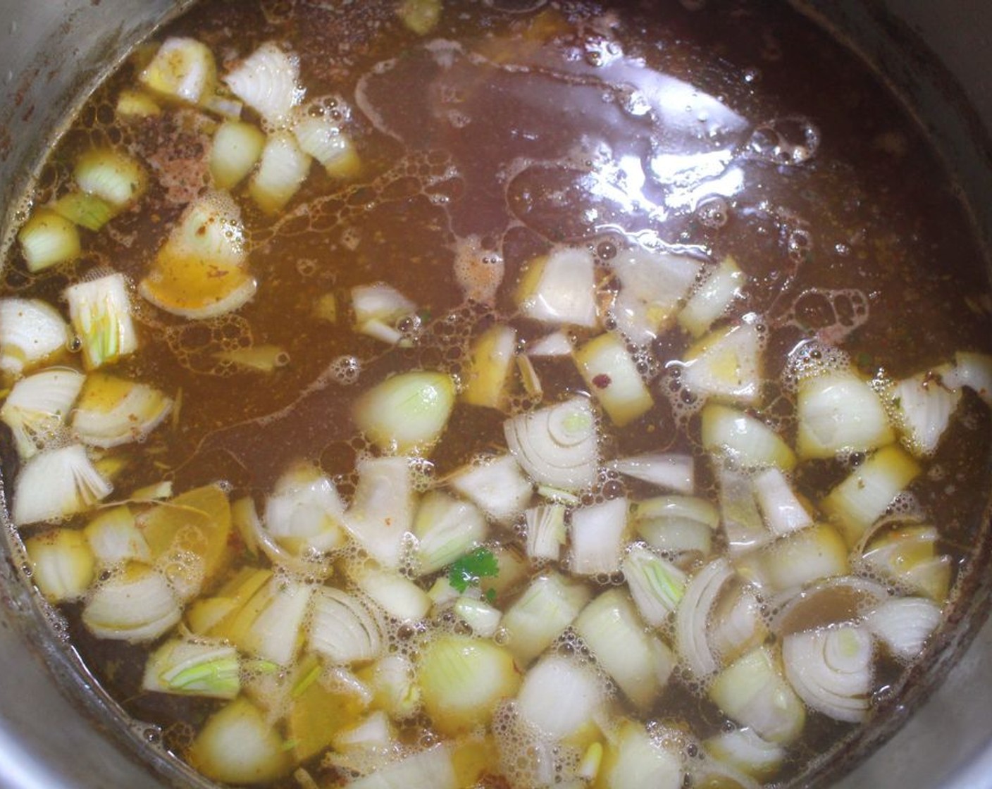 step 7 Add the carrots and onions to the broth, simmer until tender but not mushy.