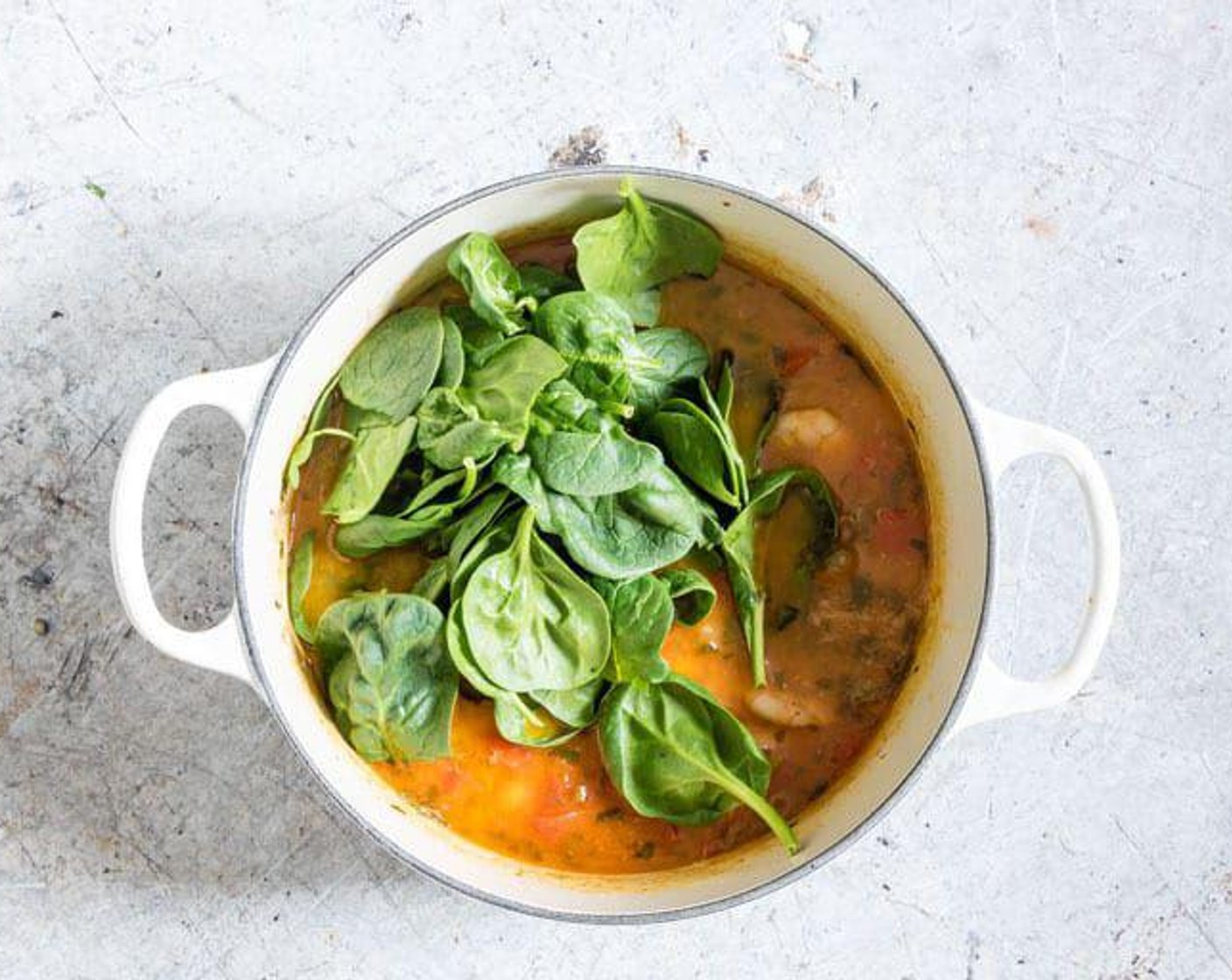 step 5 Stir in the Fresh Baby Spinach (1 2/3 cups) and add Fish Sauce (to taste) and switch off.