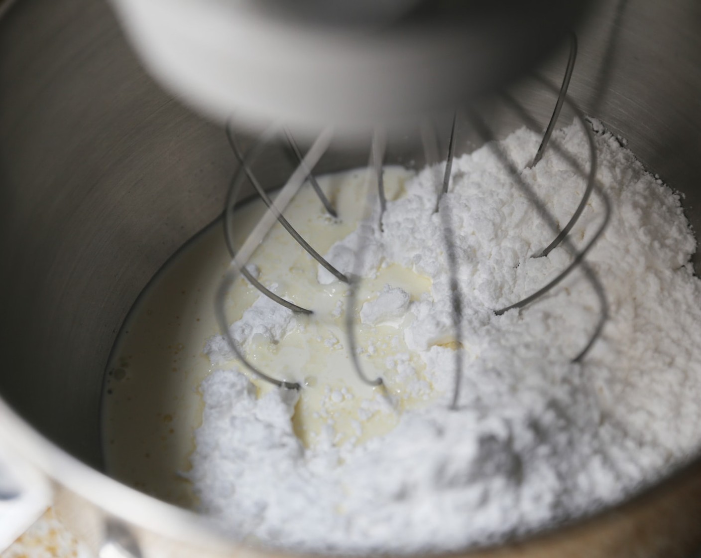 step 17 Combine the Heavy Cream (4 Tbsp) and Powdered Confectioners Sugar (2 cups) in the bowl of a stand mixer fitted with the balloon whisk. Mix on a high speed until just combined.