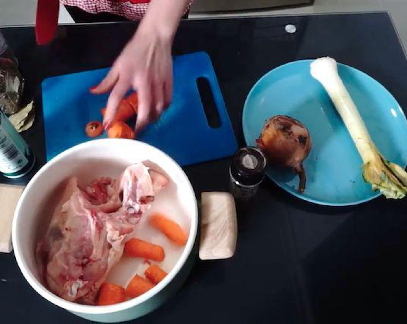 step 5 Add the chicken carcass, the vegetables plus the Celery (1 stalk), the Salt (to taste), Ground Black Pepper (to taste), Bay Leaf (1), Dried Thyme (to taste) and Dried Parsley (to taste) to a pot. Cover it with water.