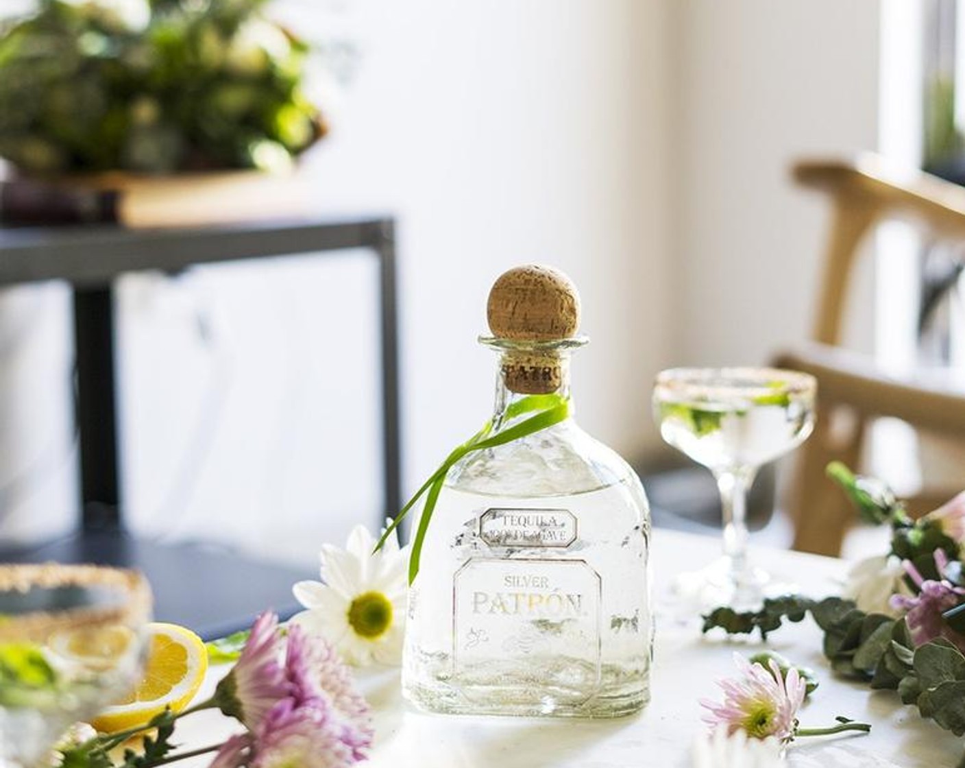 step 2 Add PATRÓN® Silver Tequila (1.5 fl oz), PATRÓN® Citrónge Orange (0.5 fl oz), Lemon (1), Apricot Liqueur (0.5 fl oz), half an ounce of the Earl Grey Tea syrup, Orange Blossom Water (3 drops), Sugar Snap Peas (1), and Fresh Mint (1 sprig).