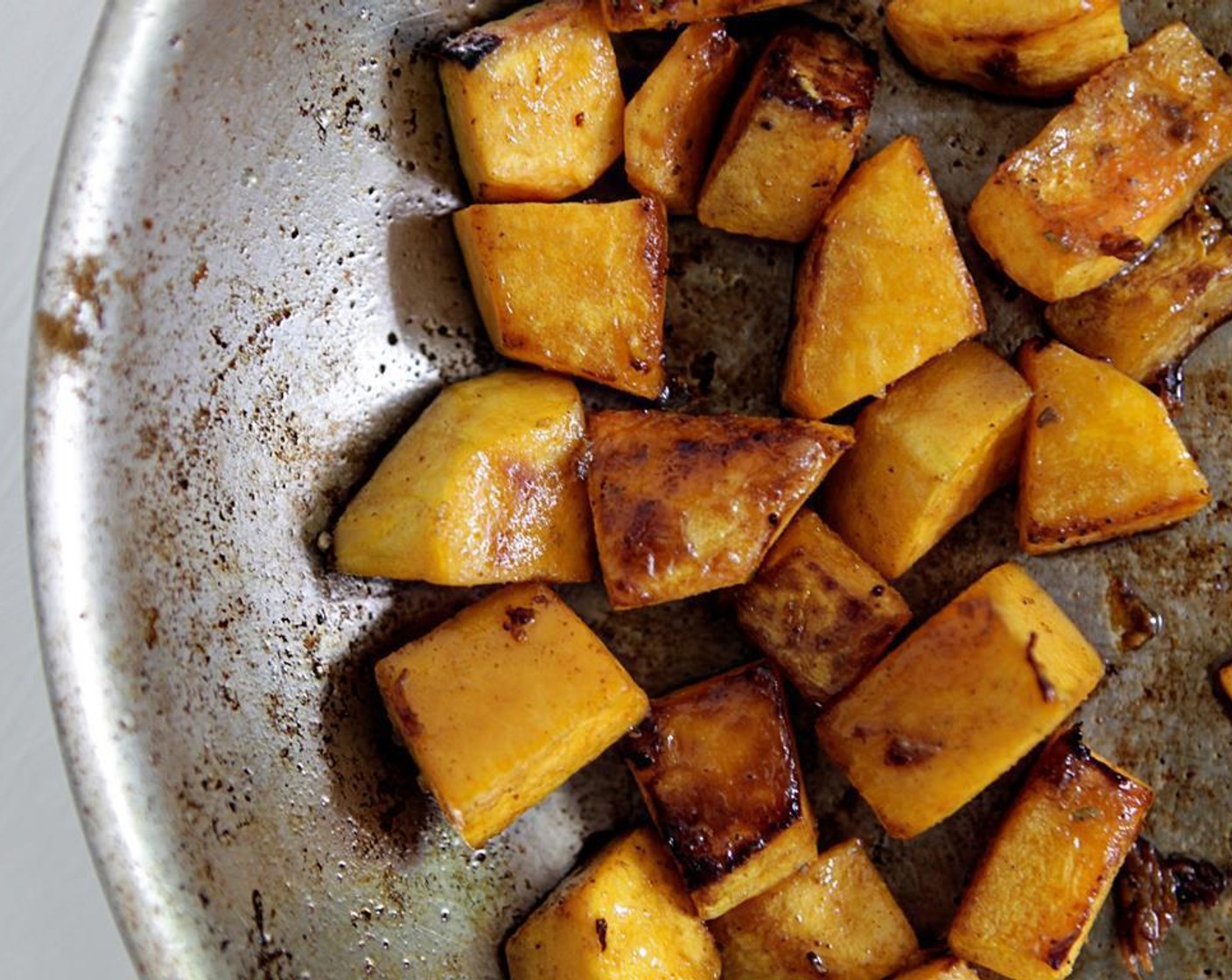 step 6 Over medium-high heat, add 2 more tablespoons of vegetable oil. Add the diced butternut squash. Stir briefly, then arrange in a single layer, and cook without stirring for about 5 min to brown the bottom sides.