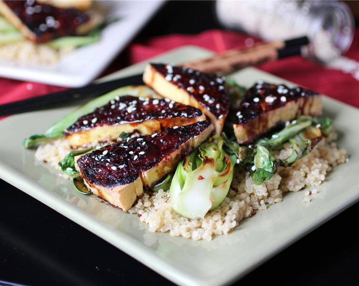 step 10 Sprinkle Crushed Red Pepper Flakes (to taste) and Sesame Seeds (to taste) on top, if desired. Serve the tofu and bok choy over quinoa, rice, or cauliflower rice.  Enjoy!