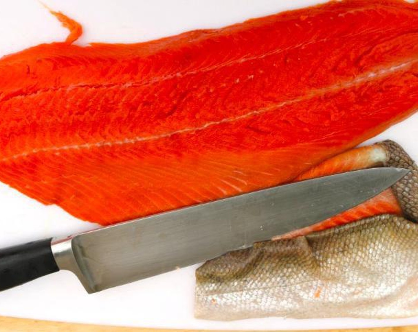 step 2 Trim the Salmon Fillets (1.5 lb), remove the skin, and remove all the pin bones with tweezers.