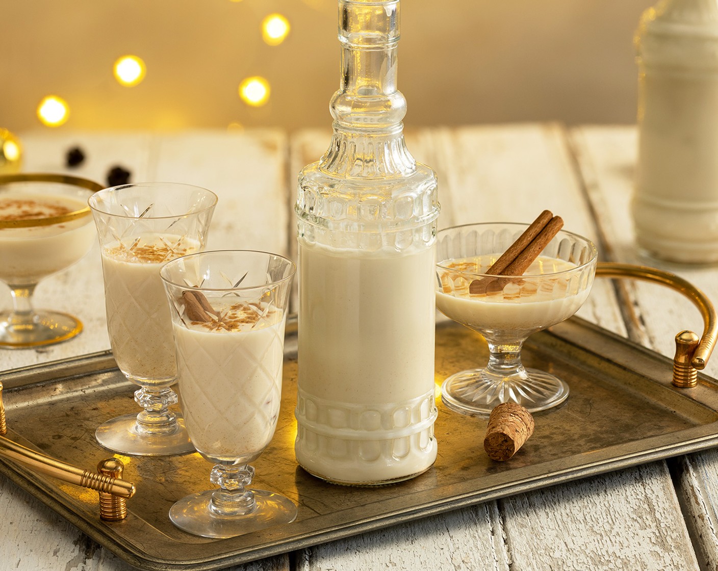 step 3 To serve, stir or shake bottle well to combine. Pour coquito into small serving glasses. Garnish with ground cinnamon and Cinnamon Sticks (to taste), if desired.