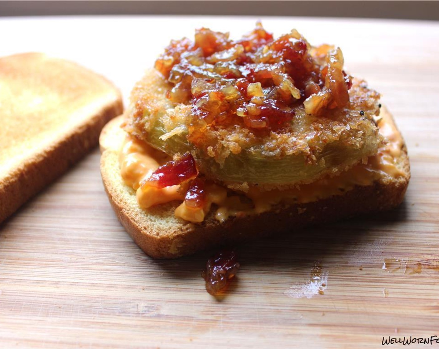 step 11 Spread about 2 tablespoons of Pimento Cheese (3/4 cup) on one slice of Potato Bread (12 slices). Top with a fried green tomatoes. Top that with a tablespoon of bacon jam and finish with another slice of potato bread.