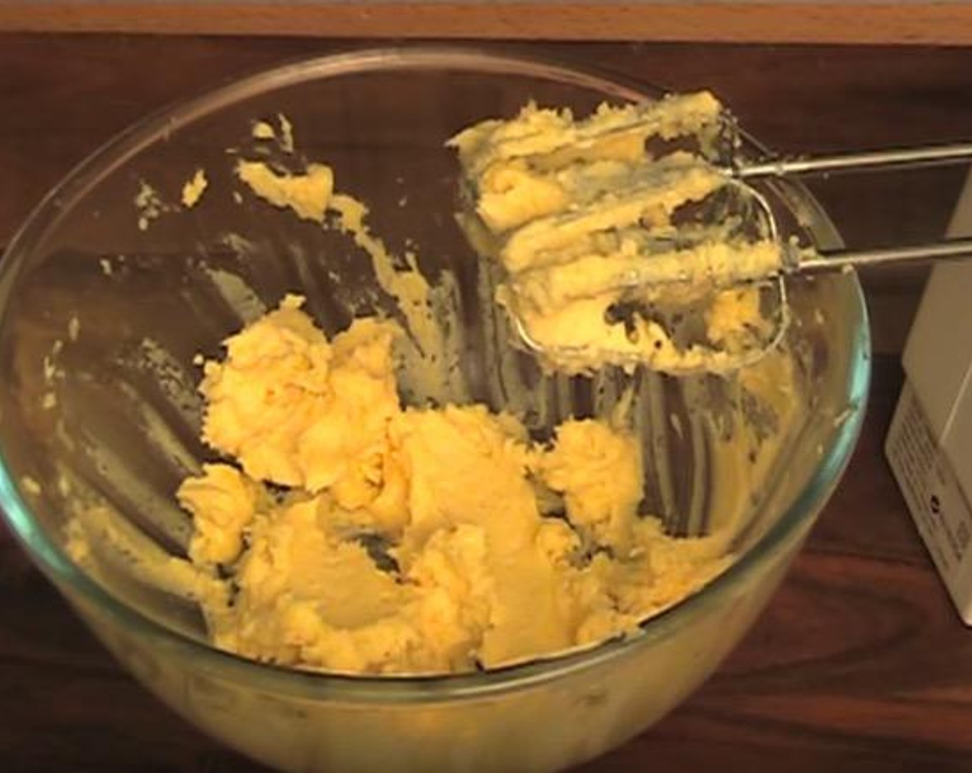 step 2 In a mixing bowl, add Butter (3/4 cup), Caster Sugar (1/2 cup) and Vanilla Extract (1 tsp). Using an electric mixer, beat together until fluffy.