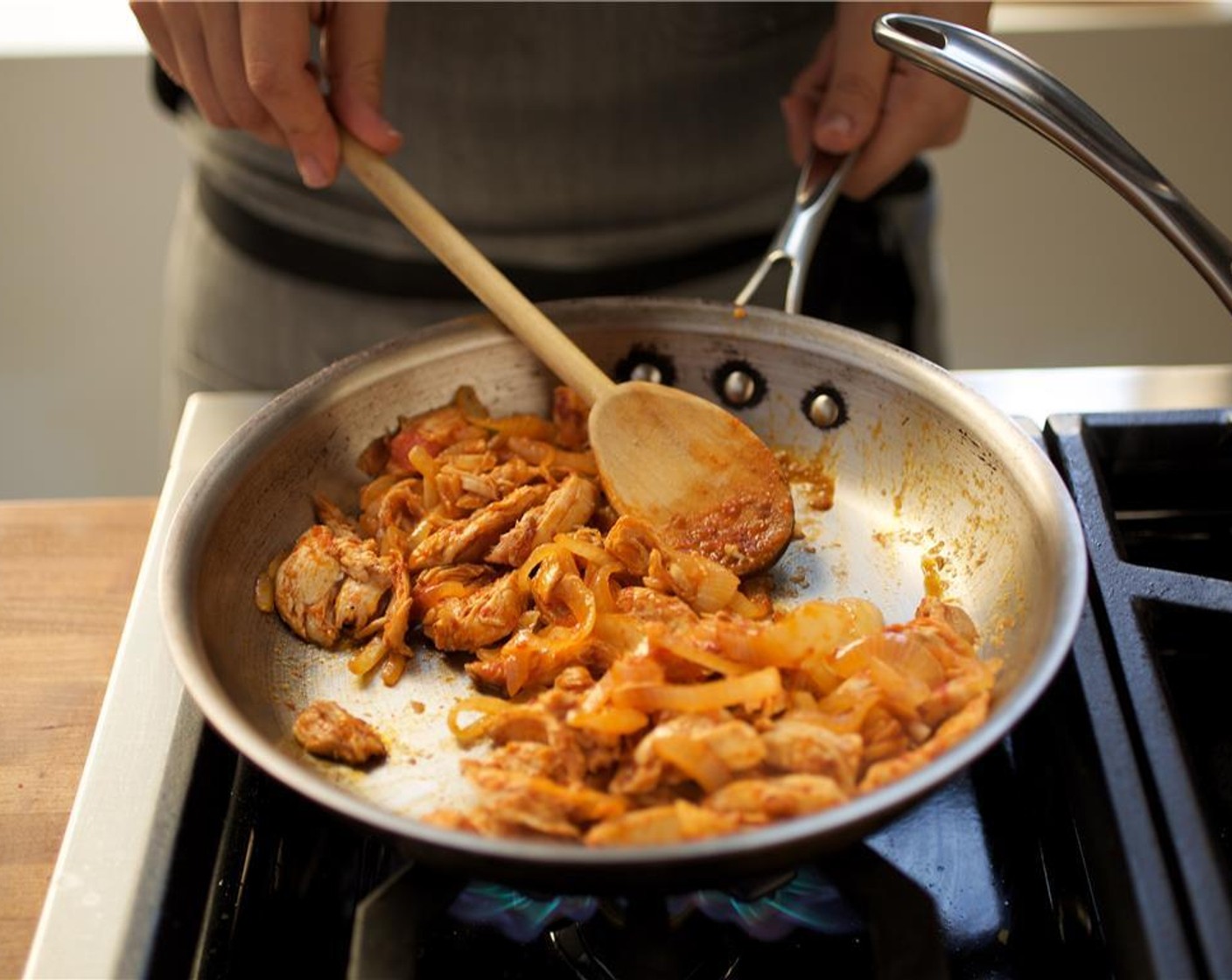 step 16 Add the shredded chicken and the chipotle sauce. Cook for three minutes until completely heated through.