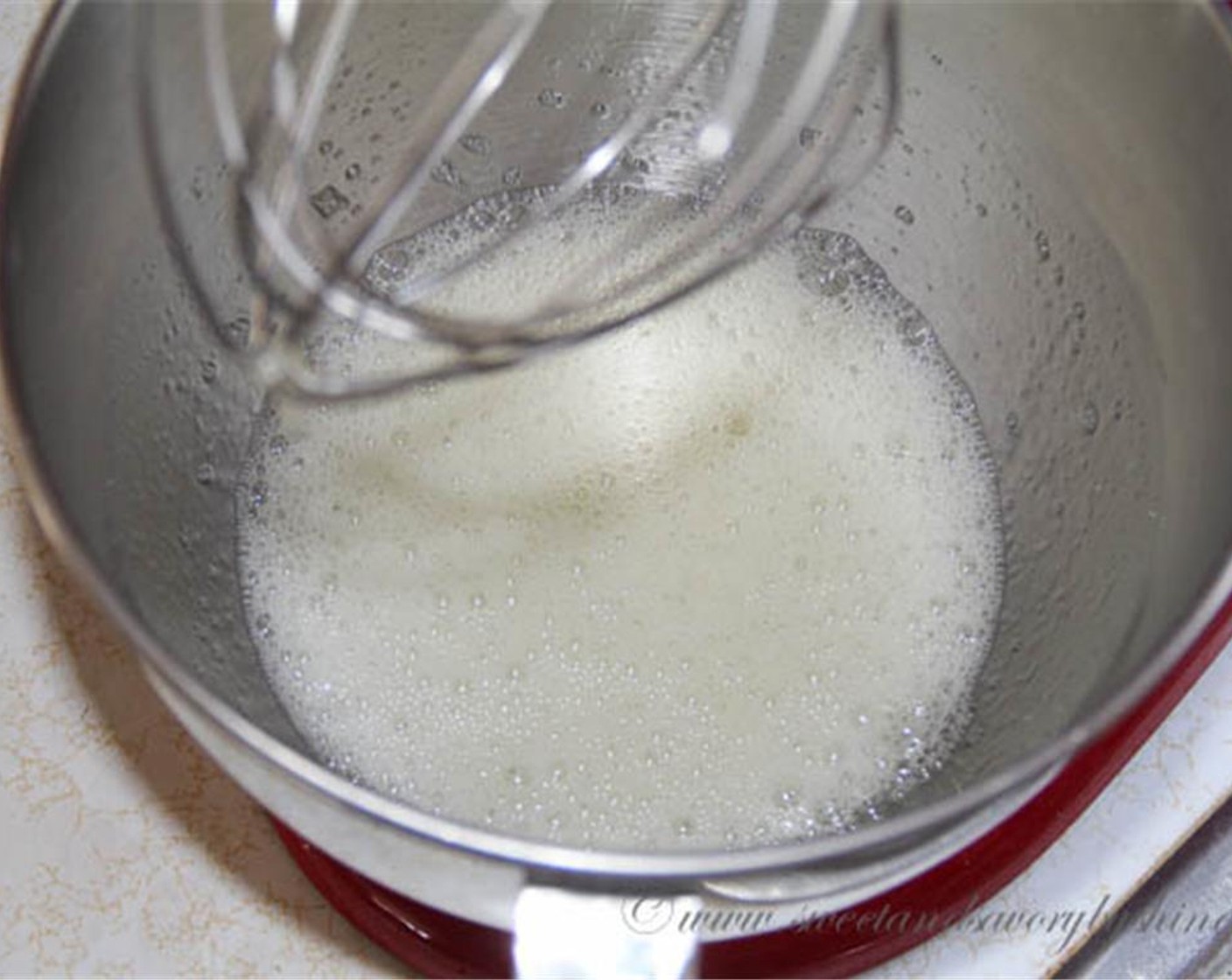step 5 In a large mixing bowl, beat the egg white until foamy on a low speed. Add Cream of Tartar (1 tsp) and Salt (1/2 tsp) and continue to beat, gradually increasing the speed to high.