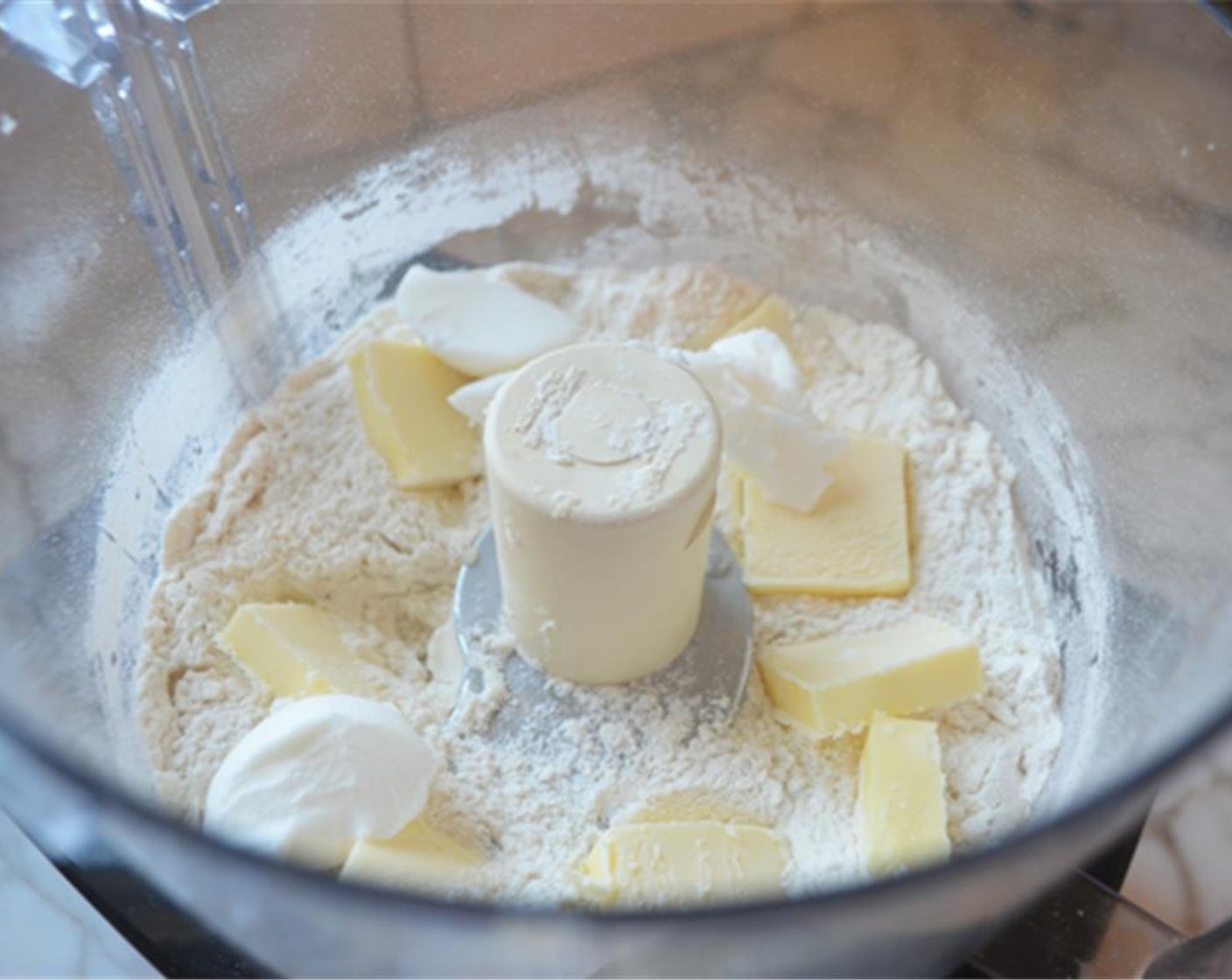 step 2 Add the pieces of Unsalted Butter (1/3 cup) and Vegetable Shortening (3 Tbsp) and pulse until you have coarse crumbs.