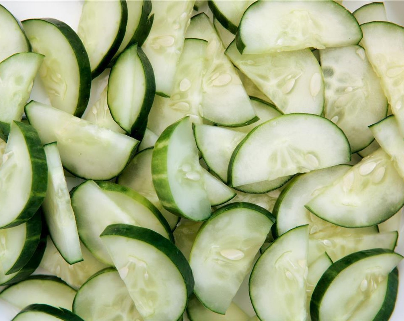 step 5 As the oven preheats, make the minted creamy cucumbers. Mix the sliced cucumber and Kosher Salt (1/2 tsp) in a colander or strainer, over the sink or a bowl. Let stand 10-15 minutes. Then squeeze the slices gently and dry on  paper towels.