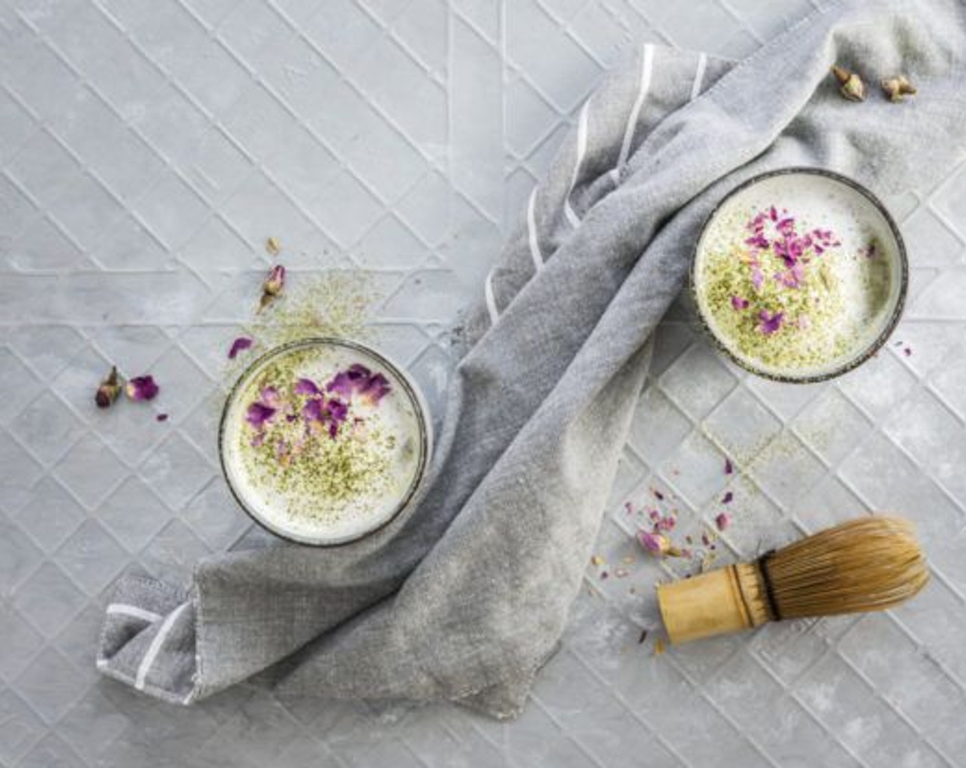 step 7 Pour into cups. Add Coconut Milk (1/2 cup) that you have heated and whisked in a different cup and sprinkle with extra matcha and Edible Dried Rose Petals (to taste). Enjoy!