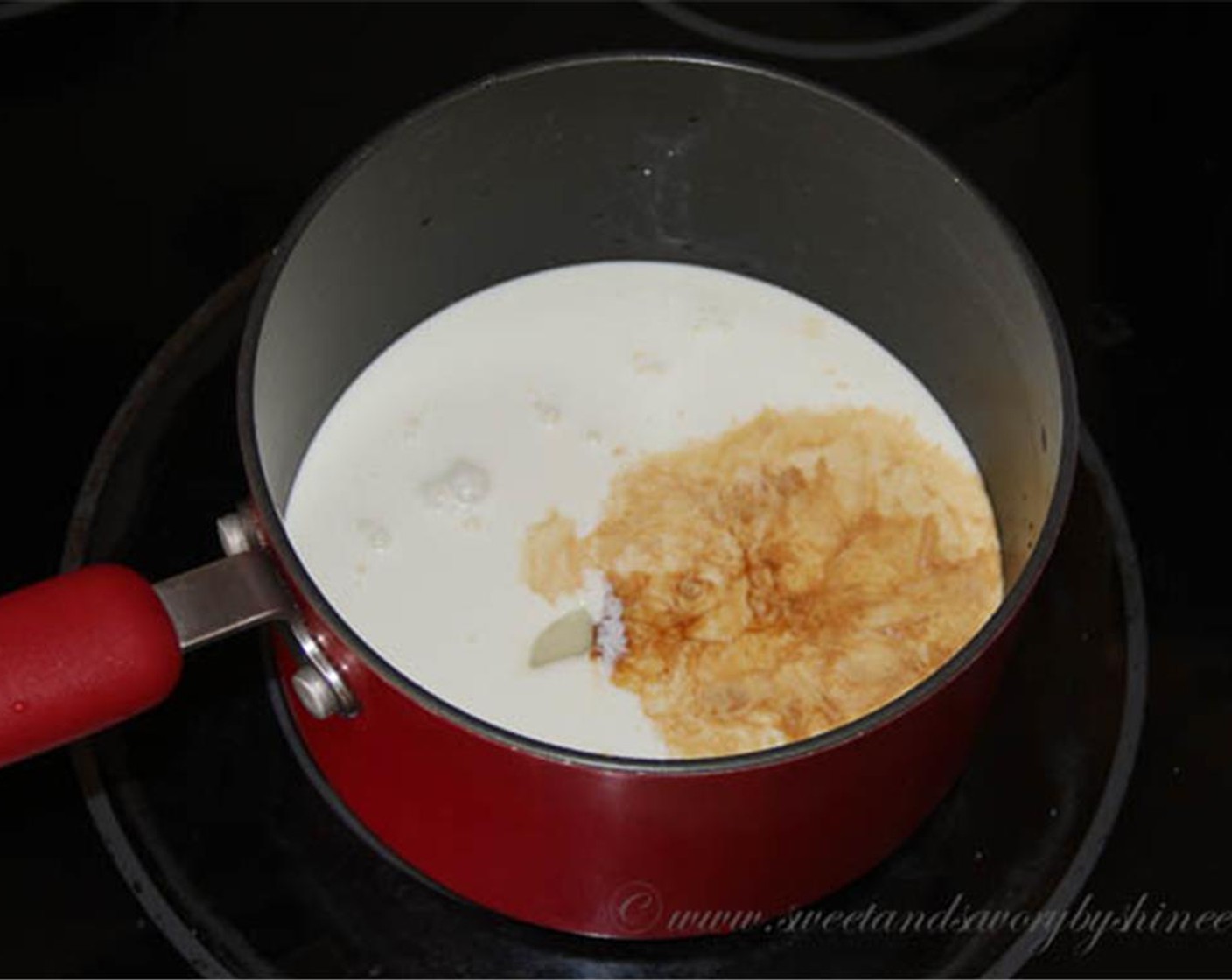 step 1 In a medium saucepan, combine Heavy Cream (1/2 cup), Sweetened Condensed Milk (4 Tbsp), Vanilla Extract (1 tsp) and Salt (1 pinch) and bring it to a simmer over medium heat.