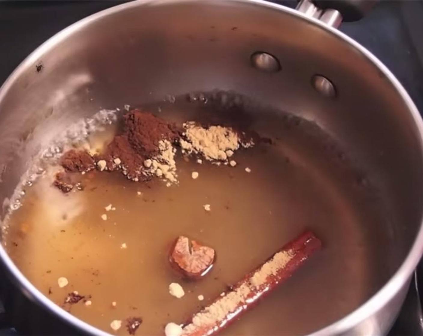 step 2 Add in Cinnamon Sticks (3), Ground Ginger (1 tsp), Whole Nutmeg (1/2), and Ground Cloves (1 tsp) and stir to combine. Bubble for 15-20 minutes.