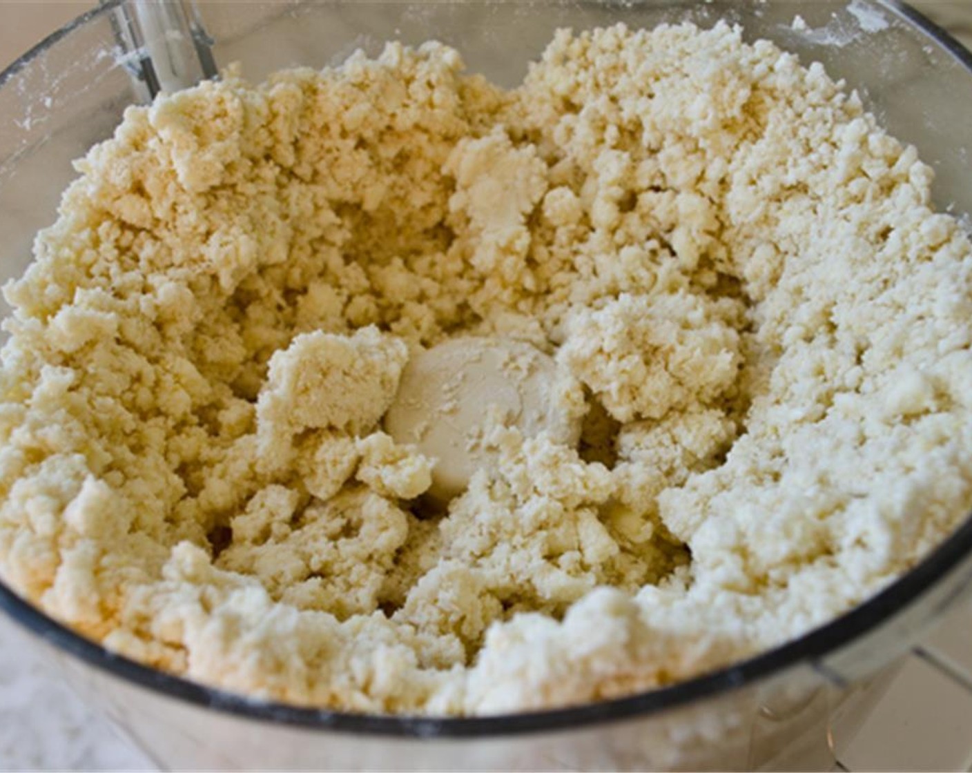 step 2 Add Unsalted Butter (1 cup), Cream Cheese (1 cup), and Eggland's Best Classic Egg (1). Pulse until the dough is moistened and crumbly with curd-like pieces about the size of peas.