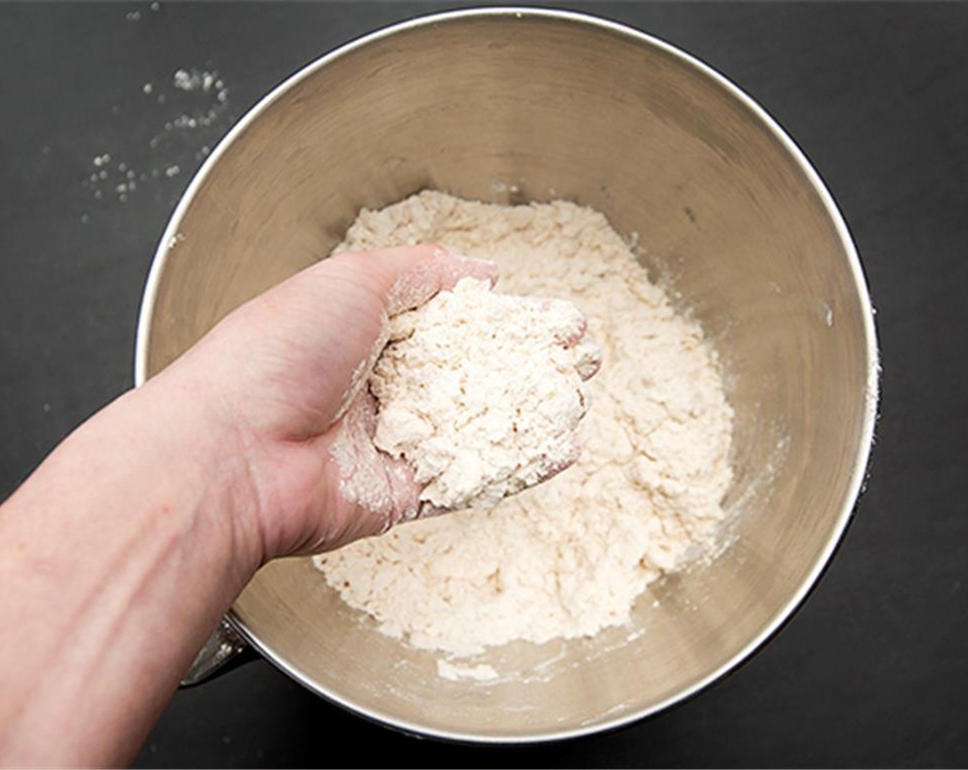 step 2 Add in the Butter (1 cup) and work in with fingers. Work until you have pea size pieces.