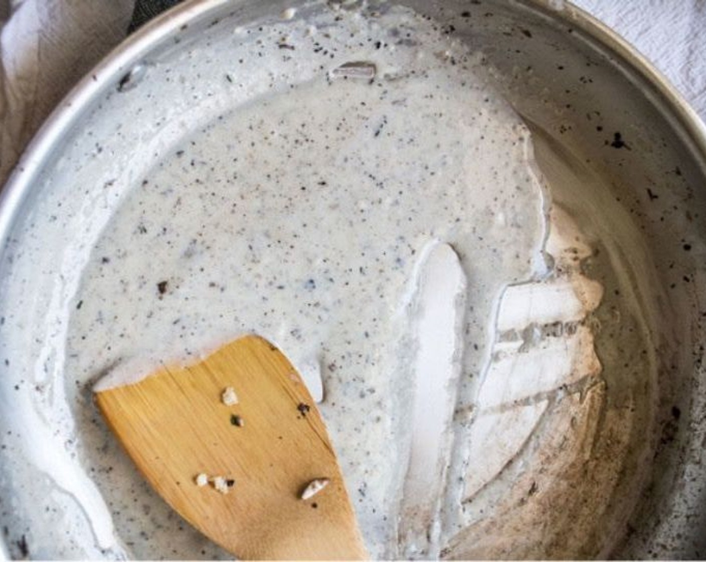 step 7 In a small bowl, mix Water (1 Tbsp) and Corn Starch (1 tsp). Add mixture to the hot pan with leftover seasoning and juice, along with 2% Reduced Fat Milk (1/4 cup), Garlic Salt (1/4 tsp), and Freshly Ground Black Pepper (1/4 tsp). Bring to a low boil, then reduce heat and allow to simmer for 3-4 minutes or until thick. This does not make a large amount of sauce, but you just need enough for a light coating over the pizza.