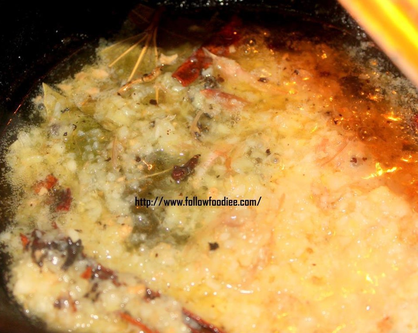 step 5 Heat Oil (2 Tbsp) in a wok. Add Whole Garam Masala Spices (to taste) and fry. Add Ginger Garlic Paste (2 Tbsp) and cook until the raw smell goes away.