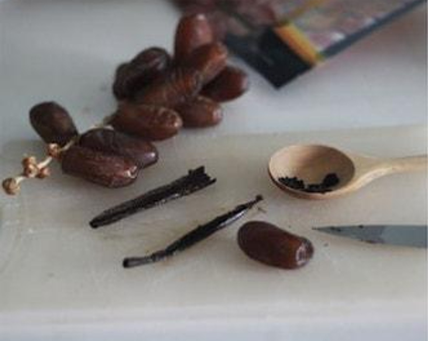 step 5 Rince out the blender and put Vanilla Extract (1 tsp) and chopped Medjool Dates (1) into it.