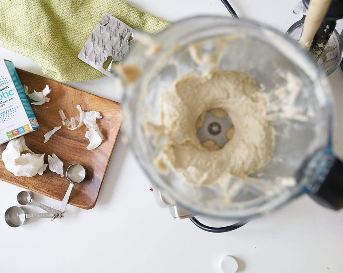 step 3 Open up two capsules of Probiotic Capsules (2) and sprinkle into a blender and blend again.